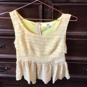 Yellow sleeveless blouse